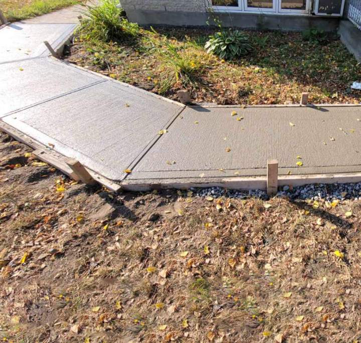 Construction de trottoirs en béton Laval